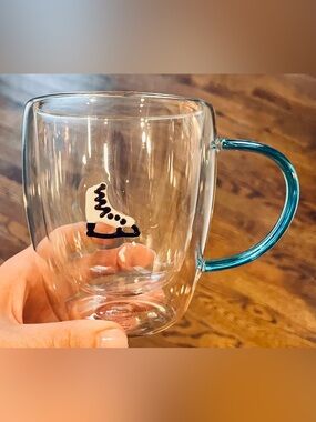 Anthropologie Icon Holiday Glass Juice Mug with Blue Handle Ice Figure Skate